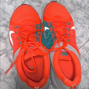 Neon reflective nikes